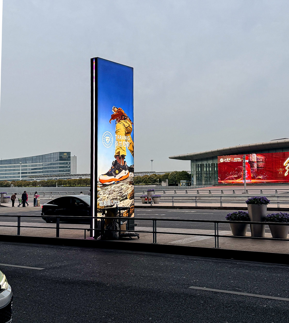 Urban LED totem at an airport drop-off